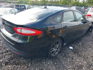 2015 Ford Fusion SE Hybrid with VIN 3FA6P0LU0FR229409, listed as a IAAI auction lot 42272404 with Not provided miles and . Bid and sale history available at DreamBid. Image 4.