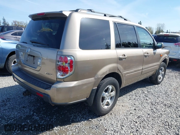 2006 Honda Pilot EX-L with VIN 2HKYF18566H561371, listed as a IAAI auction lot 41950296 with 145,579 mi miles and . Bid and sale history available at DreamBid. Image 4.