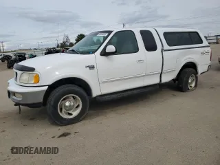 1998 Ford F-150 z VIN 1FTZX18W5WKB91459, wystawiony jako Copart lot #52369095 z przebiegiem 185 660 mil mil oraz Szkoda całkowita • Salvage title. Historia ofert i sprzedaży dostępna na DreamBid. Obrazek 1.