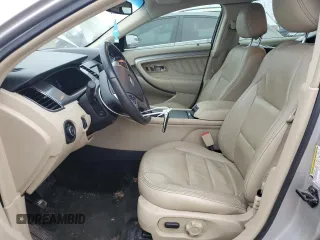 2016 Ford Taurus SEL with VIN 1FAHP2E9XGG144955, listed as a Copart auction lot 82207634 with 128,823 mi miles and Salvage Title. Bid and sale history available at DreamBid. Image 7.