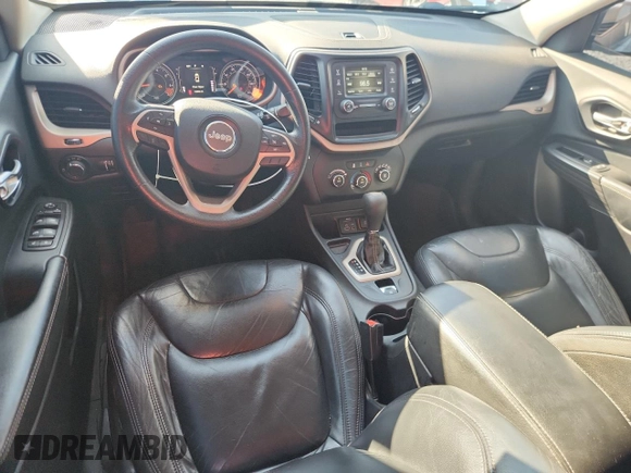 2015 Jeep Cherokee Sport with VIN 1C4PJLAB7FW617091, listed as a Copart auction lot 62167605 with 149,968 mi miles and Salvage title. Bid and sale history available at DreamBid. Image 8.