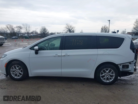 2023 Chrysler Pacifica Touring L with VIN 2C4RC1BG6PR520945, listed as a IAAI auction lot 41591128 with 70,351 mi miles and . Bid and sale history available at DreamBid. Image 15.