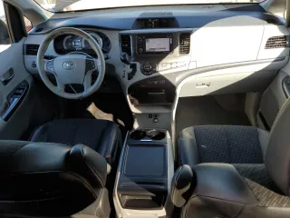 2014 Toyota Sienna SE with VIN 5TDXK3DC2ES482229, listed as a Copart auction lot 47080475 with 316,711 mi miles and Salvage Title. Bid and sale history available at DreamBid. Image 8.