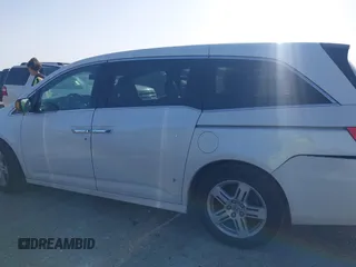 2012 Honda Odyssey Touring with VIN 5FNRL5H93CB125241, listed as a IAAI auction lot 42299053 with 125,549 mi miles and . Bid and sale history available at DreamBid. Image 14.