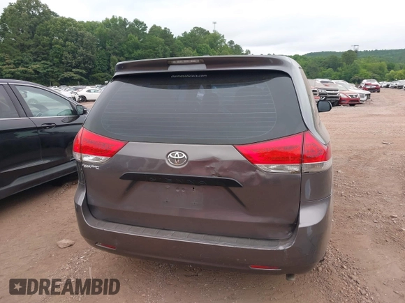 2014 Toyota Sienna L with VIN 5TDZK3DC8ES470837, listed as a IAAI auction lot 42426844 with 302,661 mi miles and . Bid and sale history available at DreamBid. Image 16.