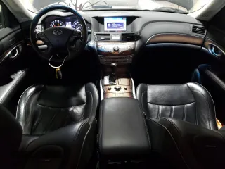 2012 Infiniti M Hybrid with VIN JN1EY1AP7CM910194, listed as a Copart auction lot 72003524 with 124,723 mi miles and Salvage title. Bid and sale history available at DreamBid. Image 8.