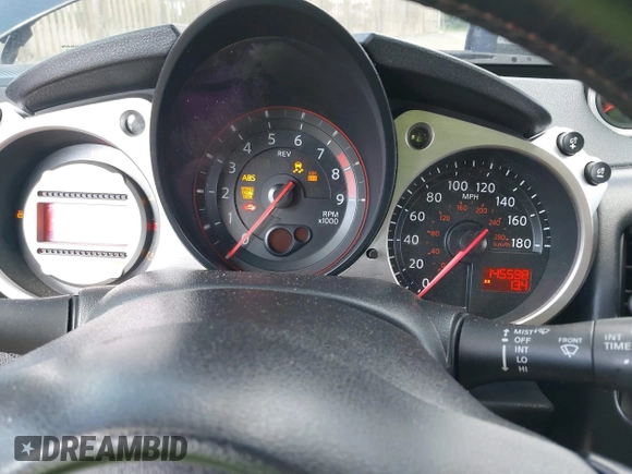 2010 Nissan 370Z Touring z VIN JN1AZ4EH1AM502464, wystawiony jako IAAI lot #42180616 z przebiegiem 145 598 mil mil oraz . Historia ofert i sprzedaży dostępna na DreamBid. Obrazek 7.