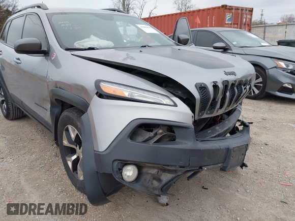 2016 Jeep Cherokee Trailhawk with VIN 1C4PJMBS7GW192574, listed as a IAAI auction lot 41986638 with 144,970 mi miles and . Bid and sale history available at DreamBid. Image 18.