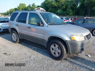 2006 Ford Escape XLT with VIN 1FMYU93156KD26045, listed as a IAAI auction lot 42503718 with 141,738 mi miles and . Bid and sale history available at DreamBid. Image 1.
