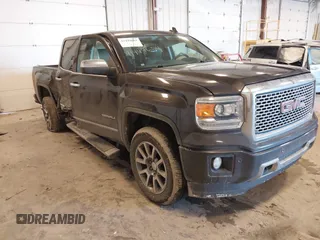2015 GMC Sierra 1500 Denali with VIN 3GTU2WECXFG262355, listed as a IAAI auction lot 41449684 with 251,279 mi miles. Bid and sale history available at carsss.com. Image 1.