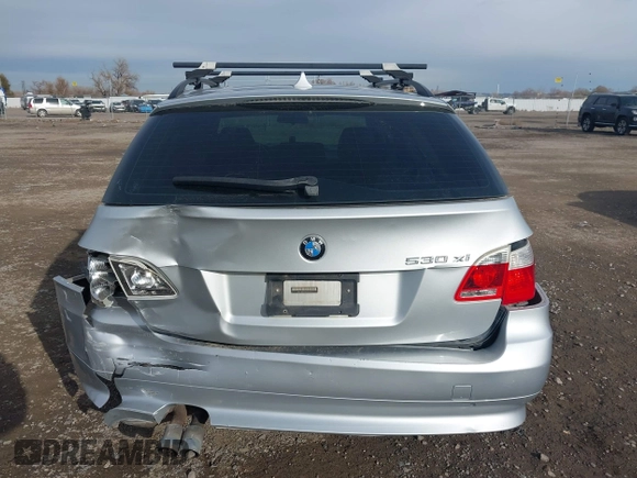 2006 BMW 5 Series 530xi with VIN WBANN73506CN01479, listed as a IAAI auction lot 40933082 with 200,464 mi miles and . Bid and sale history available at carsss.com. Image 16.