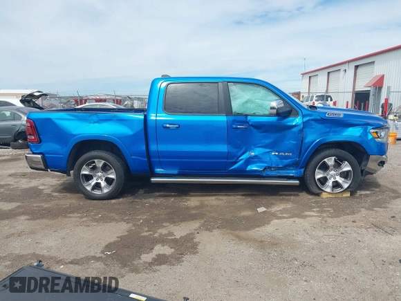 2021 Ram 1500 Laramie with VIN 1C6SRFJT1MN774879, listed as a IAAI auction lot 42242318 with 51,971 mi miles and . Bid and sale history available at DreamBid. Image 14.