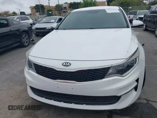 2016 Kia Optima LX with VIN 5XXGT4L32GG047624, listed as a IAAI auction lot 42068219 with 114,316 mi miles. Bid and sale history available at carsss.com. Image 6.