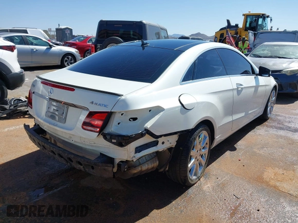 2014 Mercedes-Benz E 350 with VIN WDDKJ8JB7EF257896, listed as a IAAI auction lot 42291137 with 124,499 mi miles and . Bid and sale history available at DreamBid. Image 4.
