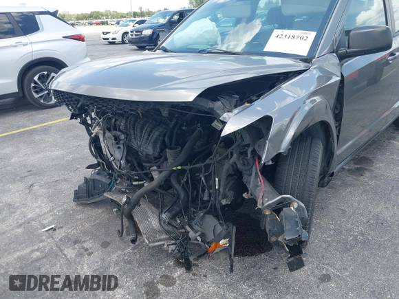 2013 Dodge Journey SE with VIN 3C4PDCAB3DT626929, listed as a IAAI auction lot 42318702 with Not provided miles and . Bid and sale history available at DreamBid. Image 14.