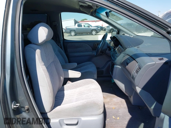 1999 Toyota Sienna LE with VIN 4T3ZF13C8XU109975, listed as a IAAI auction lot 42701961 with 194,529 mi miles and . Bid and sale history available at DreamBid. Image 5.