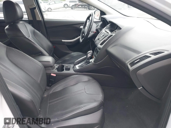 2013 Ford Focus SE with VIN 1FADP3F24DL152798, listed as a IAAI auction lot 42173023 with 133,411 mi miles and . Bid and sale history available at carsss.com. Image 5.