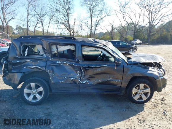 2014 Jeep Patriot Latitude with VIN 1C4NJPFB7ED856531, listed as a IAAI auction lot 41686649 with 107,889 mi miles and . Bid and sale history available at carsss.com. Image 6.
