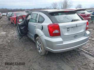 2010 Dodge Caliber SXT z VIN 1B3CB4HA0AD575917, wystawiony jako IAAI lot #41709405 z przebiegiem 213 641 mil mil oraz . Historia ofert i sprzedaży dostępna na DreamBid. Obrazek 3.