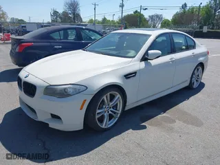 2013 BMW M5 with VIN WBSFV9C58DC773268, listed as a IAAI auction lot 41890830 with 128,399 mi miles. Bid and sale history available at carsss.com. Image 17.