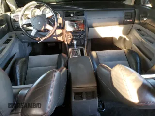 2006 Dodge Charger SRT-8 with VIN 2B3LA73W76H336981, listed as a Copart auction lot 41524535 with 102,915 mi miles and Salvage Title. Bid and sale history available at DreamBid. Image 8.