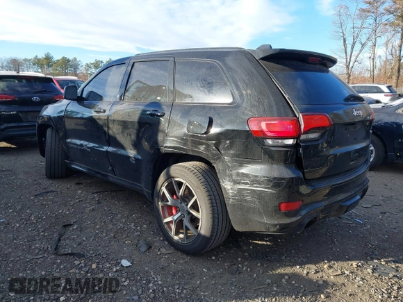 2017 Jeep Grand Cherokee SRT with VIN 1C4RJFDJ3HC694736, listed as a IAAI auction lot 41292771 with 79,966 mi miles. Bid and sale history available at carsss.com. Image 3.