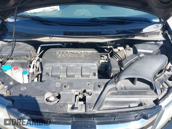 2015 Honda Odyssey EX-L with VIN 5FNRL5H68FB079528, listed as a IAAI auction lot 41893783 with 90,371 mi miles and . Bid and sale history available at DreamBid. Image 10.