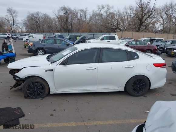 2017 Kia Optima LX with VIN 5XXGT4L32HG171992, listed as a IAAI auction lot 41477494 with 119,415 mi miles. Bid and sale history available at carsss.com. Image 13.