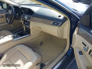 2014 Mercedes-Benz E-Class E 350 Luxury with VIN WDDHF8JB9EA842584, listed as a IAAI auction lot 40699399 with 160,687 mi miles. Bid and sale history available at carsss.com. Image 5.