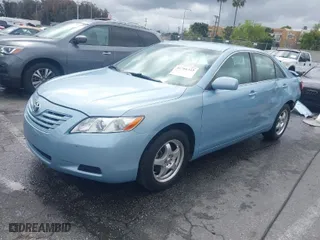 2007 Toyota Camry LE with VIN 4T1BK46K17U559350, listed as a IAAI auction lot 41766333 with 77,043 mi miles. Bid and sale history available at carsss.com. Image 2.