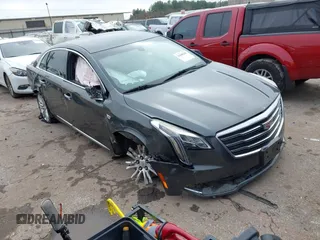 2018 Cadillac XTS Luxury with VIN 2G61M5S30J9164758, listed as a IAAI auction lot 41648265 with 173,134 mi miles and . Bid and sale history available at carsss.com. Image 1.