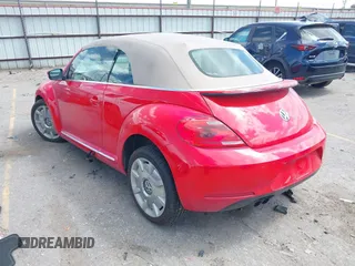 2015 Volkswagen Beetle 1.8T w/Tech with VIN 3VW517AT4FM803238, listed as a IAAI auction lot 41812373 with 42,369 mi miles and . Bid and sale history available at DreamBid. Image 3.
