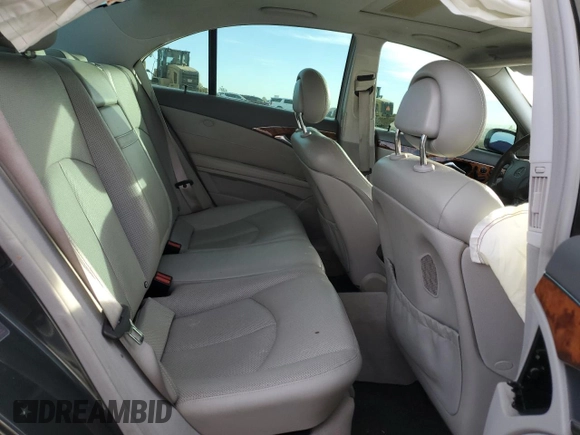 2003 Mercedes-Benz E-Class 5.0L with VIN WDBUF70J83A205550, listed as a Copart auction lot 76399474 with 118,646 mi miles and Salvage Title. Bid and sale history available at carsss.com. Image 10.