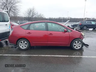 2005 Toyota Prius z VIN JTDKB20U257055663, wystawiony jako IAAI lot #41580381 z przebiegiem 123 032 mil mil oraz . Historia ofert i sprzedaży dostępna na DreamBid. Obrazek 13.