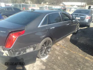 2016 Cadillac CT6 Platinum AWD with VIN 1G6KK5R68GU151651, listed as a IAAI auction lot 41527079 with 89,139 mi miles and . Bid and sale history available at DreamBid. Image 4.