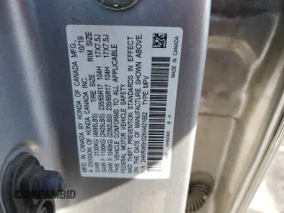 2019 Honda CR-V LX z VIN 2HKRW5H32KH421662, wystawiony jako Copart lot #52364655 z przebiegiem 108 182 mil mil oraz Szkoda całkowita • Salvage title. Historia ofert i sprzedaży dostępna na DreamBid. Obrazek 13.