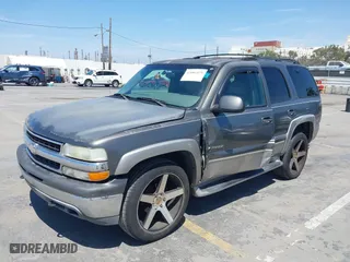 2001 Chevrolet Tahoe LT with VIN 1GNEC13T91R113281, listed as a IAAI auction lot 42081879 with 227,760 mi miles. Bid and sale history available at carsss.com. Image 2.