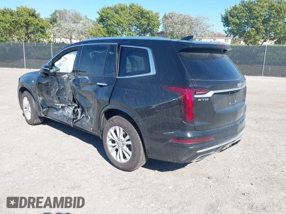 2021 Cadillac XT6 Luxury with VIN 1GYKPAR48MZ171154, listed as a IAAI auction lot 41639465 with 41,183 mi miles. Bid and sale history available at carsss.com. Image 3.