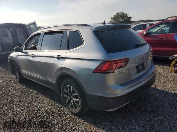 2021 Volkswagen Tiguan S with VIN 3VV1B7AX9MM023655, listed as a Copart auction lot 64159445 with 55,795 mi miles and Salvage title. Bid and sale history available at DreamBid. Image 2.