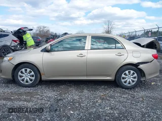 2010 Toyota Corolla with VIN 2T1BU4EE0AC312979, listed as a IAAI auction lot 41981699 with 156,842 mi miles. Bid and sale history available at carsss.com. Image 14.