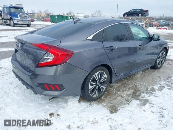 2017 Honda Civic EX-T with VIN 19XFC1E38HE031851, listed as a IAAI auction lot 41625294 with 97,432 mi miles and . Bid and sale history available at DreamBid. Image 4.