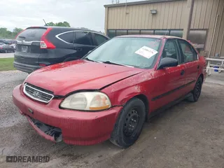 1997 Honda Civic LX "O" w/Air with VIN 1HGEJ6672VL019621, listed as a IAAI auction lot 42081226 with 194,957 mi miles. Bid and sale history available at carsss.com. Image 2.