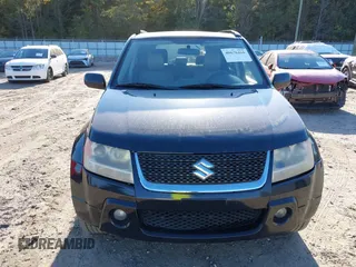 2011 Suzuki Grand Vitara Limited z VIN JS3TE0D72B4100152, wystawiony jako IAAI lot #40676416 z przebiegiem 193 097 mil mil oraz . Historia ofert i sprzedaży dostępna na DreamBid. Obrazek 12.