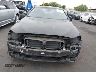 2015 BMW 5 Series 528i with VIN WBA5A5C56FD514814, listed as a IAAI auction lot 42052381 with 76,306 mi miles. Bid and sale history available at carsss.com. Image 13.