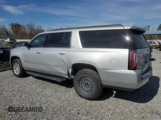 2018 GMC Yukon XL SLT with VIN 1GKS1GKCXJR328985, listed as a Copart auction lot 49485935 with 114,927 mi miles and Salvage Title. Bid and sale history available at carsss.com. Image 2.