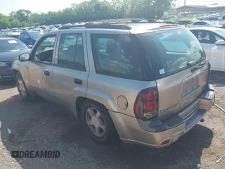 2002 Chevrolet TrailBlazer LS with VIN 1GNDS13S322303772, listed as a IAAI auction lot 42143005 with 208,765 mi miles and . Bid and sale history available at DreamBid. Image 3.