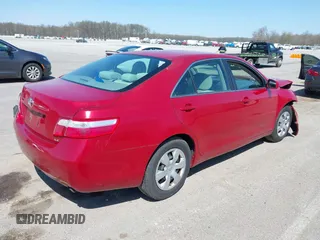2007 Toyota Camry CE with VIN 4T1BE46K47U026559, listed as a IAAI auction lot 41969062 with 248,730 mi miles. Bid and sale history available at carsss.com. Image 4.