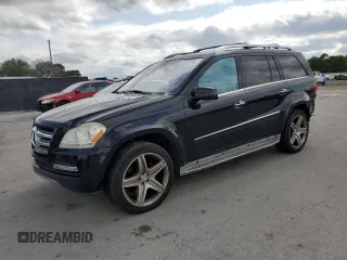 2011 Mercedes-Benz GL-Class GL 550 with VIN 4JGBF8GE3BA717024, listed as a Copart auction lot 52305705 with 191,543 mi miles and Salvage Title. Bid and sale history available at carsss.com. Image 1.