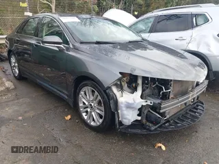 2015 Lincoln MKZ z VIN 3LN6L2JK8FR619141, wystawiony jako IAAI lot #41095940 z przebiegiem 129 715 mil mil oraz . Historia ofert i sprzedaży dostępna na DreamBid. Obrazek 1.