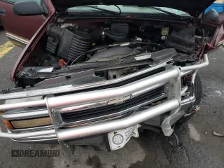 1999 Chevrolet Suburban with VIN 1GNFK16R7XJ402741, listed as a Copart auction lot 73283404 with 143,943 mi miles and Salvage Title. Bid and sale history available at carsss.com. Image 13.